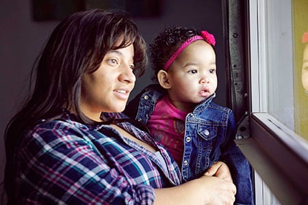 About 15 woman with child - about