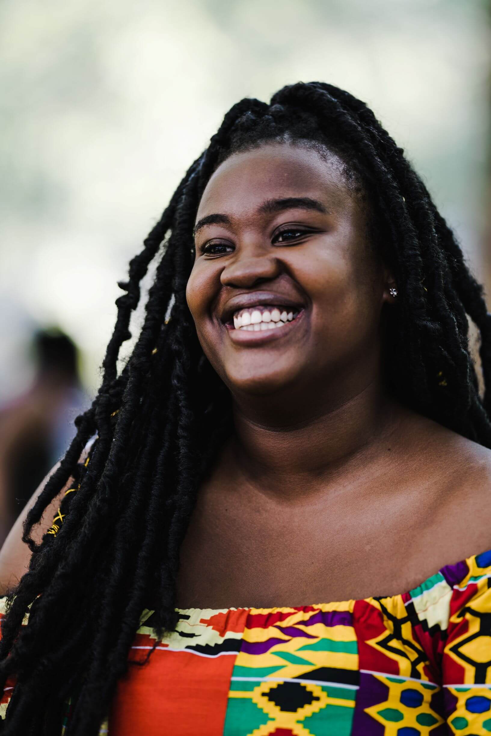 black-woman-with-braids-smiling black woman with braids smiling