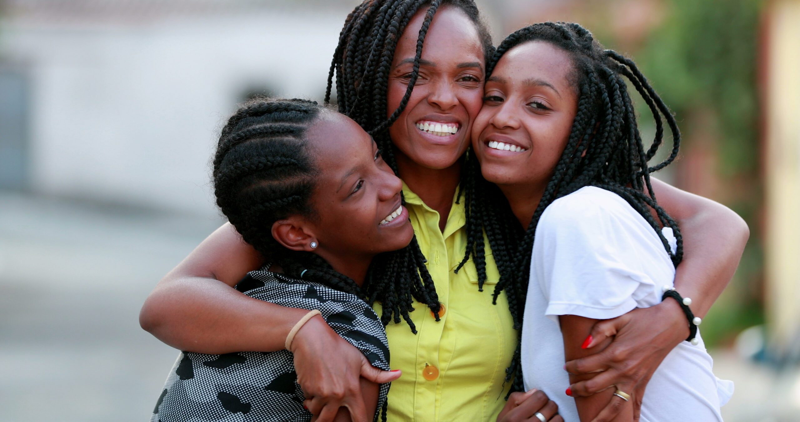 Funny,Mother,Hugging,Daughters,Outside.,African,Black,Ethnicity,Family,Love Camilla's Story Blog Photo 1